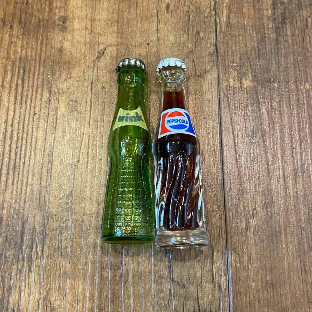 Miniature Pepsi and Wink soda bottles